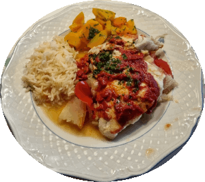 Gedünsteter Fisch mit Äpfeln und Tomaten